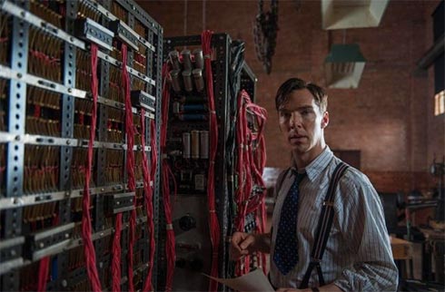 Benedict Cumberbatch next to an early computer