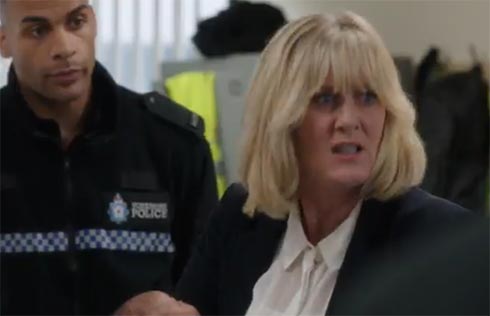 Caroline finds Flora at the police station.