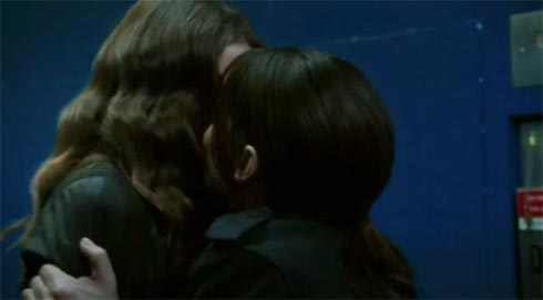 Shaw and Root kissing