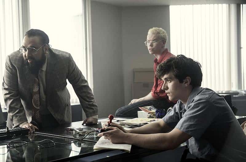 Will Poulter, Asim Chaudhry, and Fionn Whitehead in Black Mirror: Bandersnatch