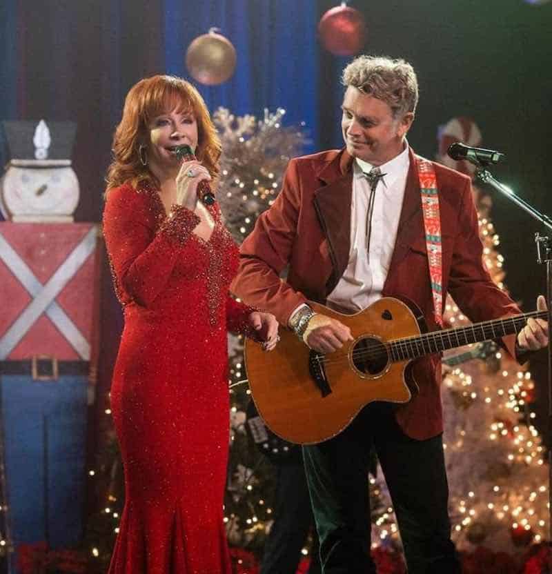 Reba McEntire and John Schneider in Christmas in Tune