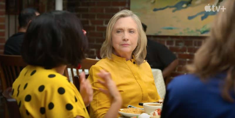 Hillary Clinton listens in Gutsy