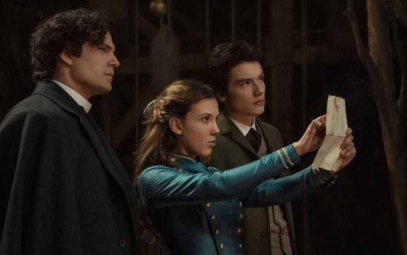 Henry Cavill, Millie Bobby Brown, and Louis Partridge in Enola Holmes 2 