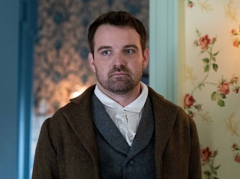 Micah Stock in Kindred dressed in gentlemen's clothes from 1815