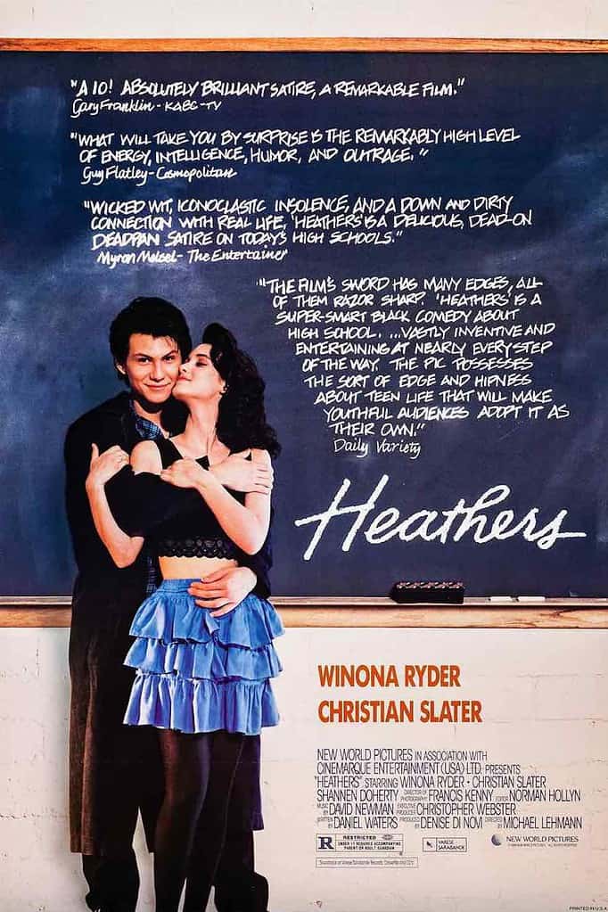 Christian Slater and Winona Ryder on a poster for Heathers with critics quotes praising the film
