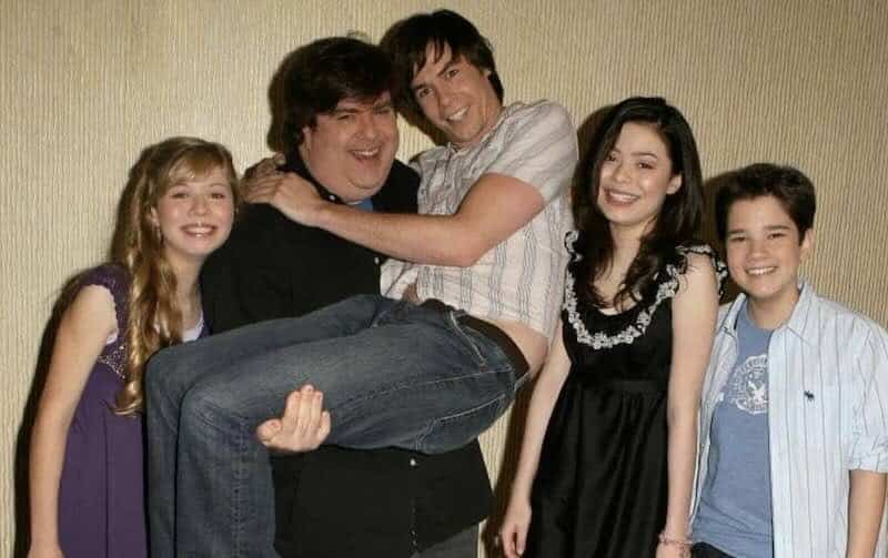 Dan Schneider with a group of child actors