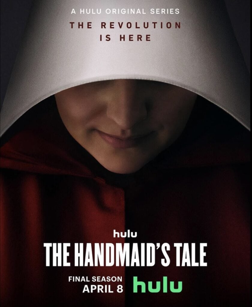 The poster for season 6 of the Handmaid's Tale. the tagline says "The Revolution is Here" and shows Elisabeth Moss dressed as a handmaid.